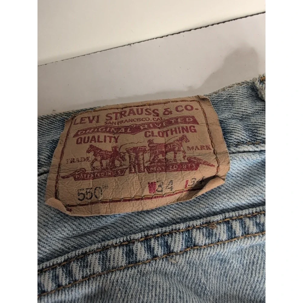 VTG Y2K Levis 550 Jeans Men's 34x34 Denim Made In USA Med Wash Light Fade 2001